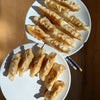 *Pork Dumplings: Local Garlic Scapes